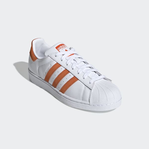 adidas white shoes with orange