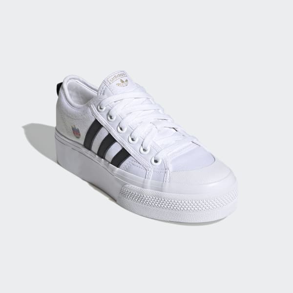 white adidas platform sneakers