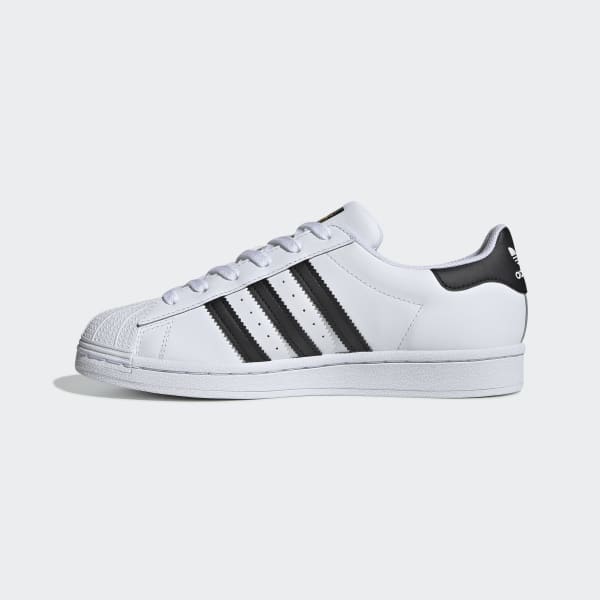adidas white trainers with black stripes