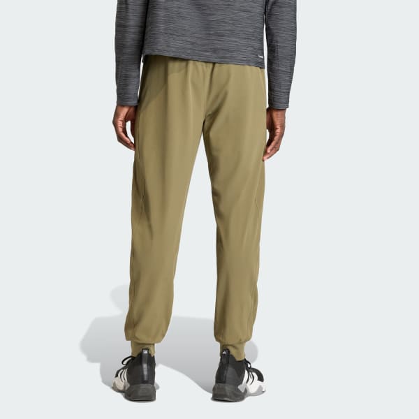 Green WORKOUT ESSENTIALS FLEX WOVEN PANT