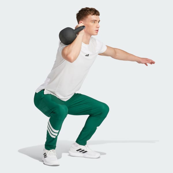 สีเขียว กางเกงขายาวผ้าทอ Icon 3-Stripes