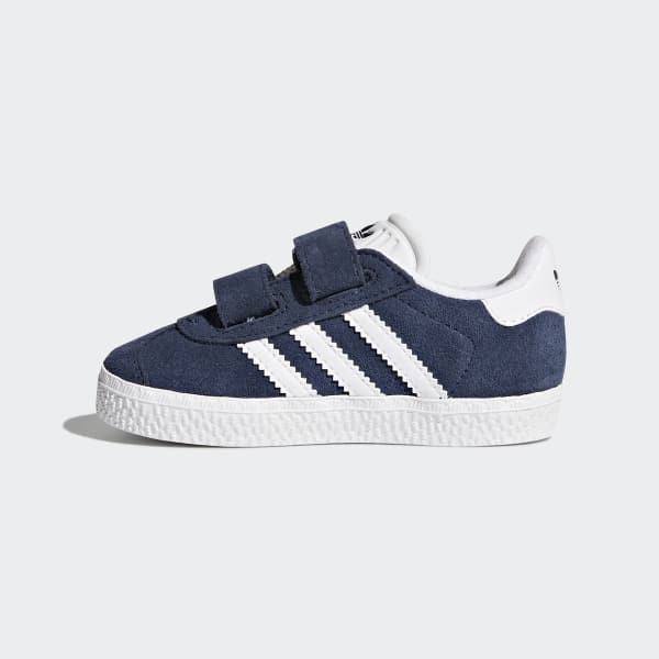 a pesar de tratar con Cerdo Zapatillas Gazelle azules y blancas para niños | adidas España