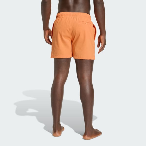 Orange ICONISEA STRETCHY SEERSUCKER SWIM SHORTS 5 INCH