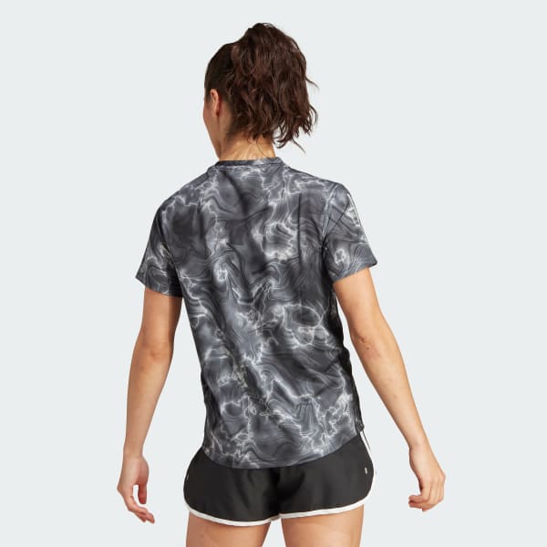 Blanco Polo Own the Run Estampado