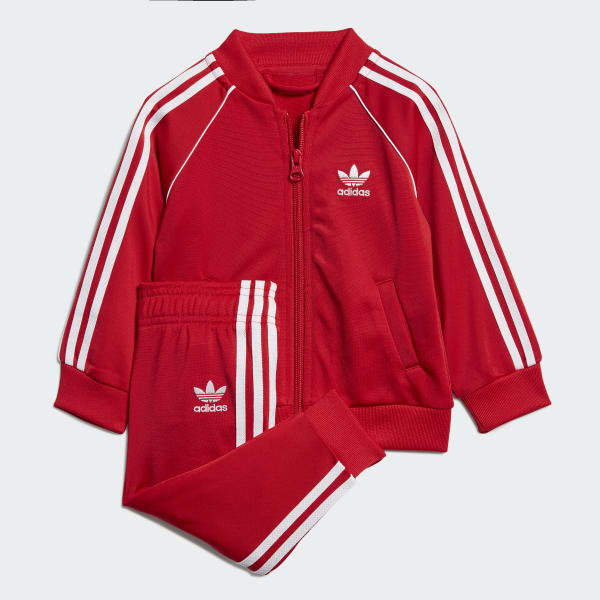red adidas pants and jacket