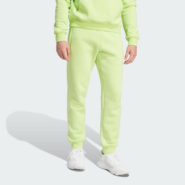 Green adidas pants yellow top