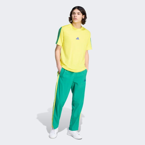 Verde Calça Esportiva em Malha e Bainha Aberta Essentials Três Listras