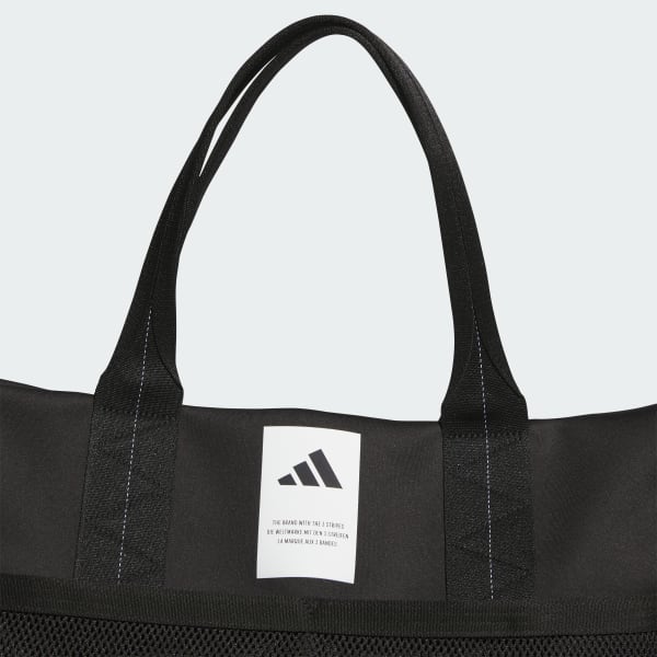 エムエイチエル MHL. MHL ADJUSTABLE STRAP TOTE （YELLOW