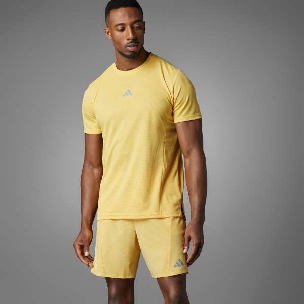 สีเหลือง เสื้อยืดพิมพ์ลาย Designed for Training HIIT Workout HEAT.RDY