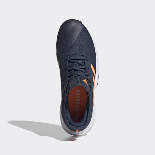 navy blue and orange adidas shoes