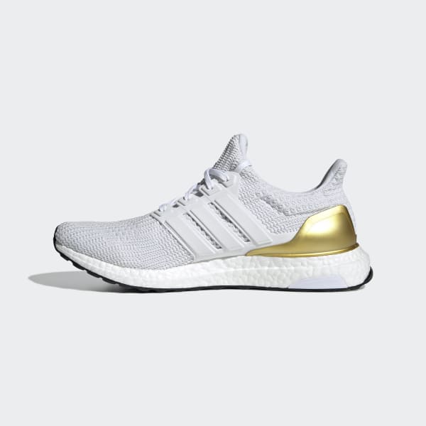 Adidas black and gold ultra boost top