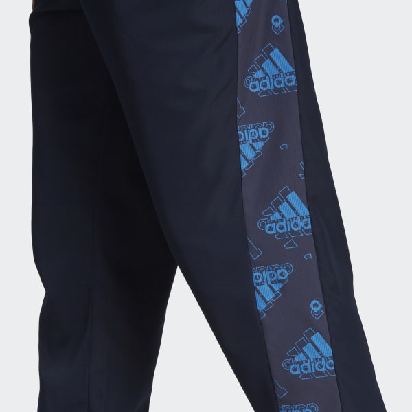 Bla Woven Allover Print træningsdragt UV642