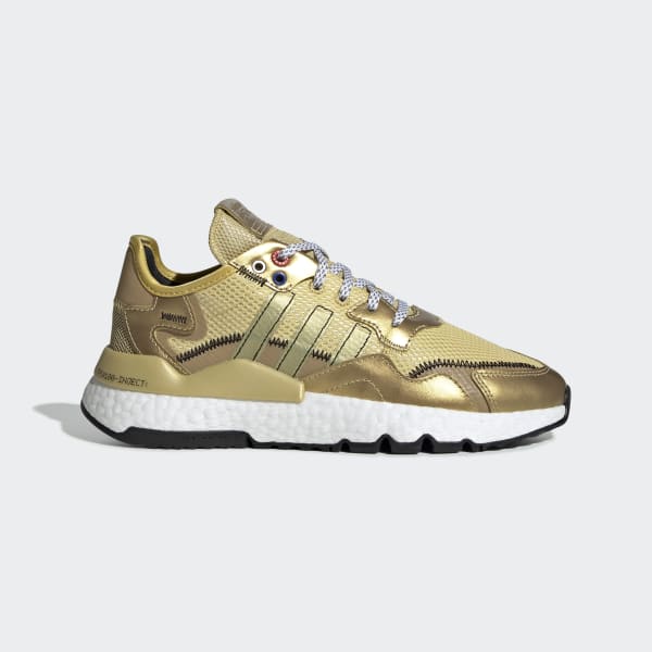 adidas originals nite jogger trainers in silver and gold