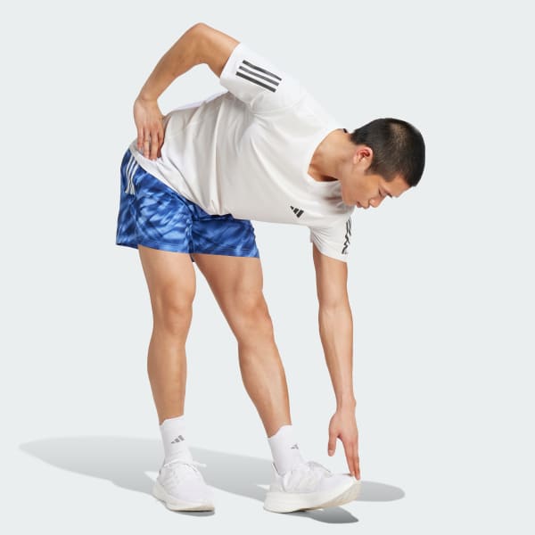 Blue Own The Run Allover Print Shorts