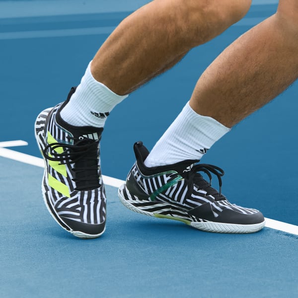 black and teal tennis shoes