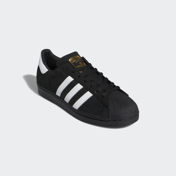 adidas black and gold superstar