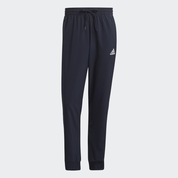 modrá Kalhoty AEROREADY Essentials Tapered Cuff Woven 3-Stripes 31272