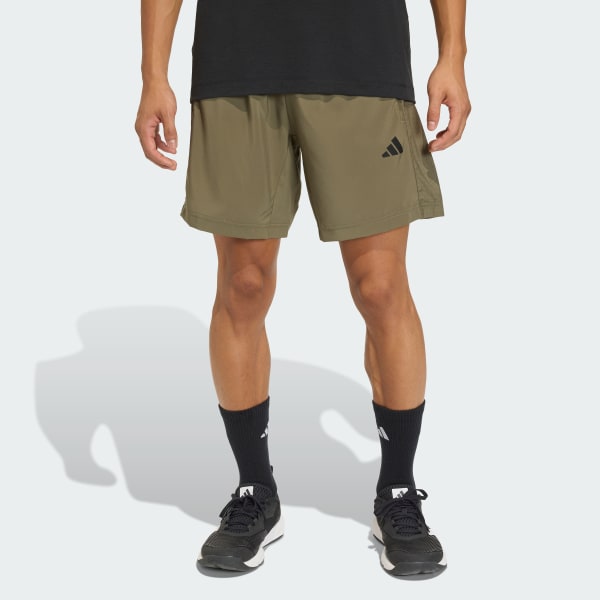 Green WORKOUT ESSENTIALS BASE WOVEN SHORT