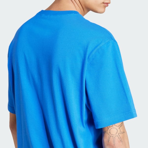 新品タグ付 バリエーショングラフィックTシャツ 青 アディダス デイ グラフィックTシャツ - ブルー | アディダス