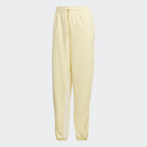 Jaune Pantalon sportswear oversize à 3 bandes avec zips latéraux et chevilles resserrées Hyperglam QC185