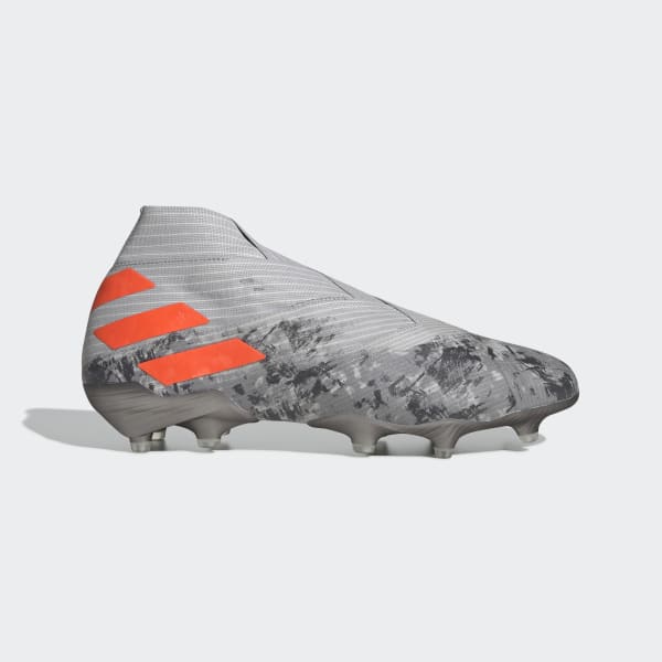 grey and orange soccer cleats