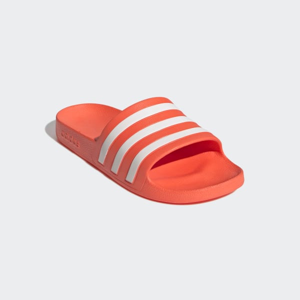 orange adilette slides