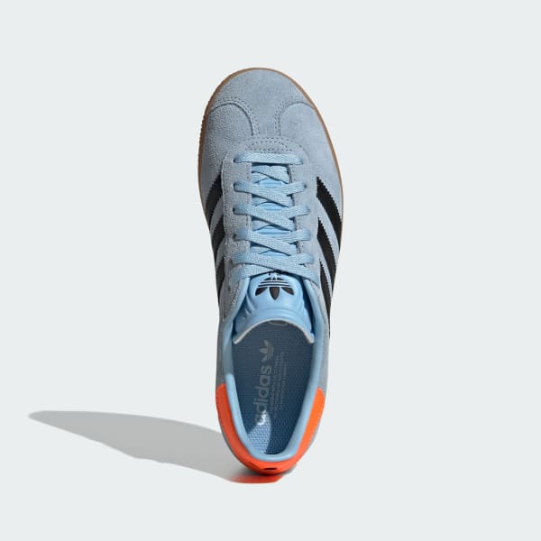 Blue adidas originals trainers store
