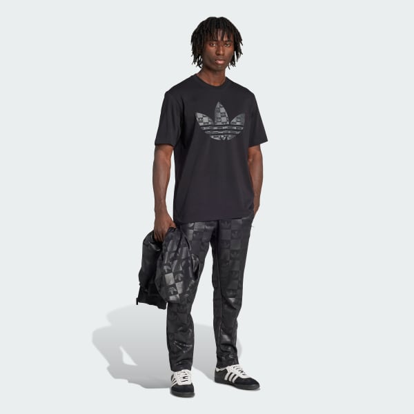 Negro Pantalón deportivo de corte regular con estampado integral de monogramas