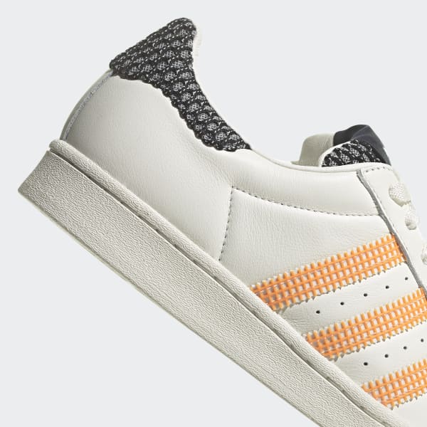 Adidas superstar white orange hot sale