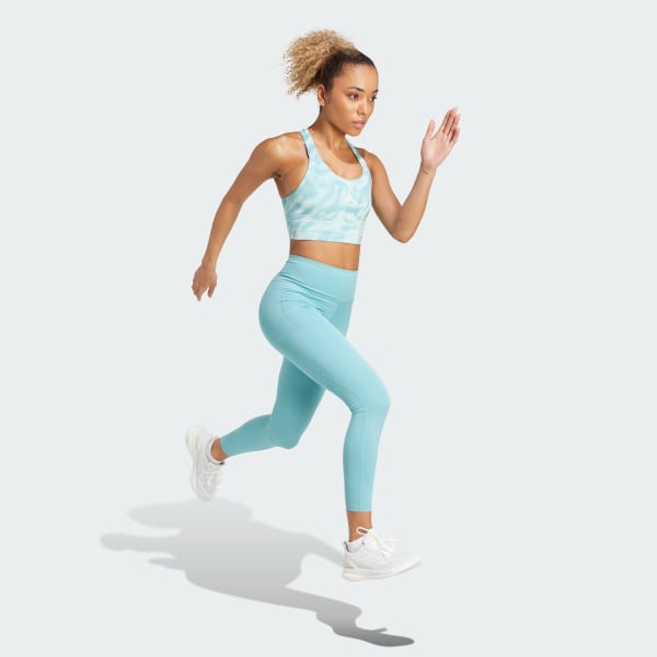 Turquesa Top deportivo de sujeción media con bolsillo para correr con estampado integral