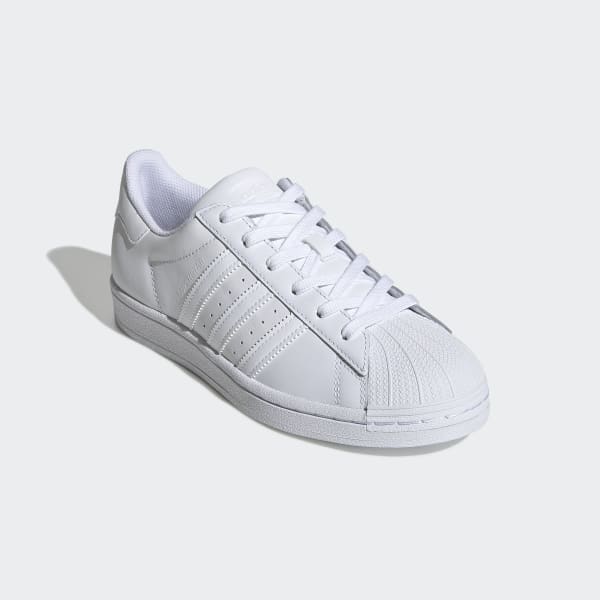all white high top shell toe adidas