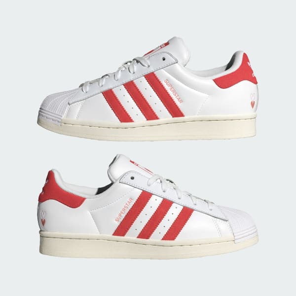 Adidas superstar strisce azzurre store