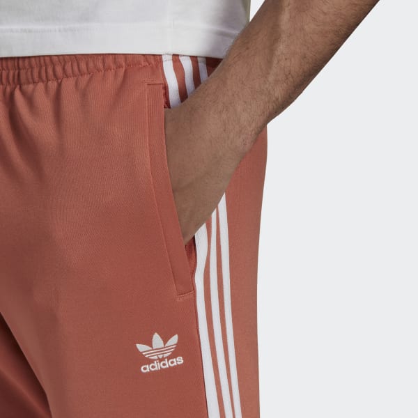 adidas adicolor Classics Primeblue SST Trainingshose - Braun | adidas Austria
