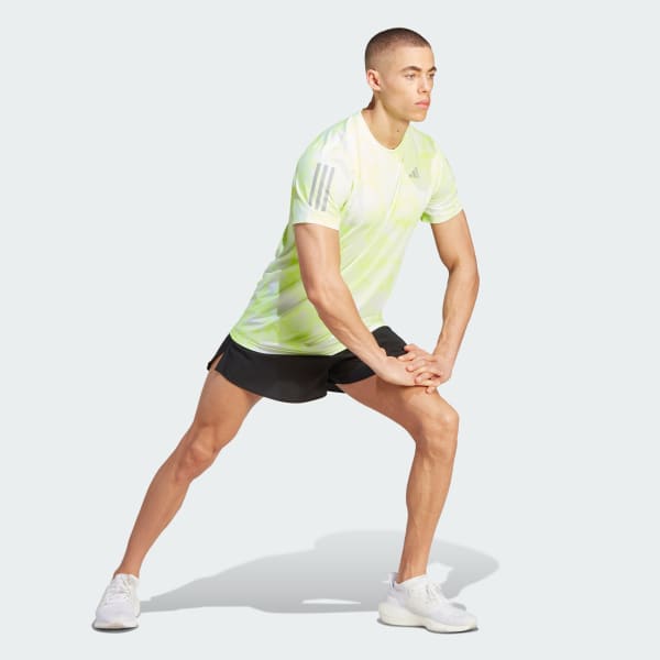 Blanco Polo Own the Run Estampado