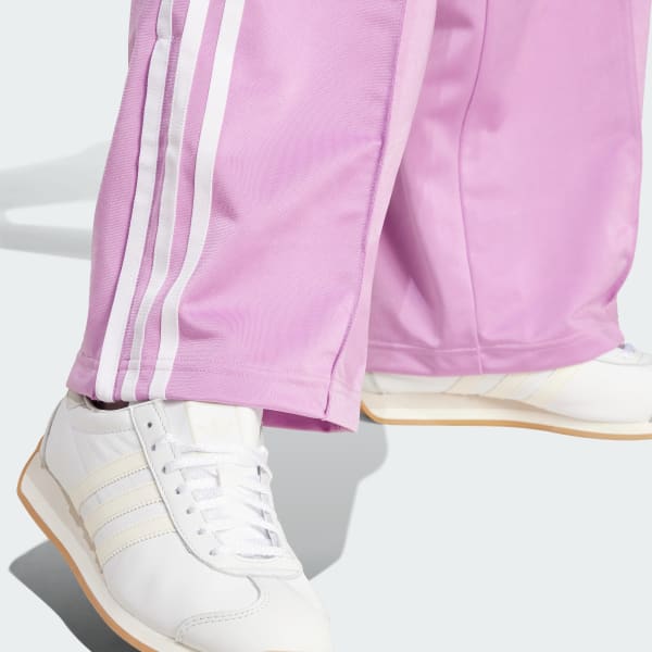 Pantalón Firebird Loose Violeta adidas adidas España - Main Image