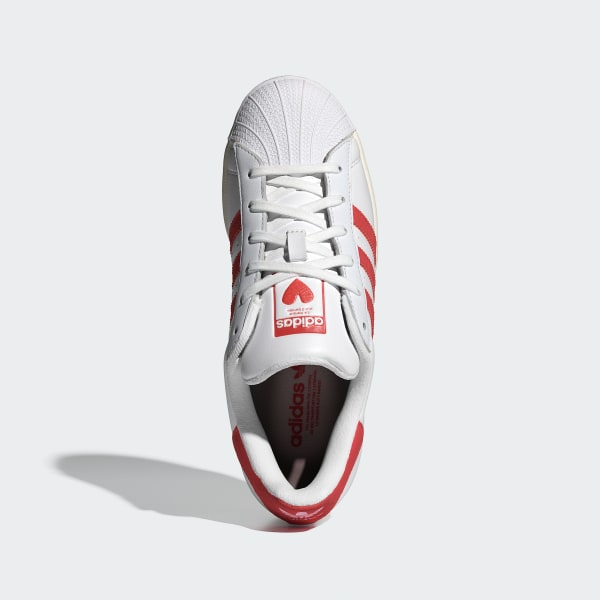 Adidas superstar strisce azzurre store
