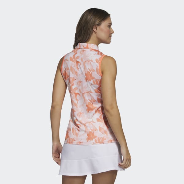 สีส้ม เสื้อโปโลลายดอกไม้