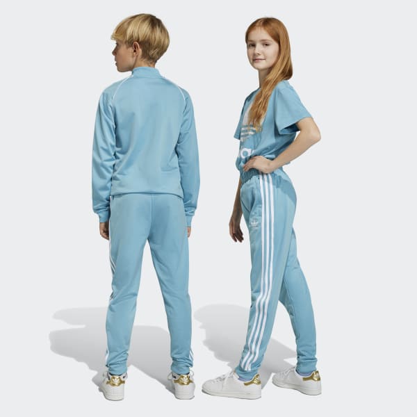 Adidas sst deals trainingspak blauw