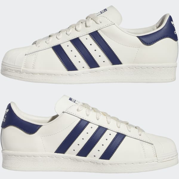 Adidas superstar navy blue and white top