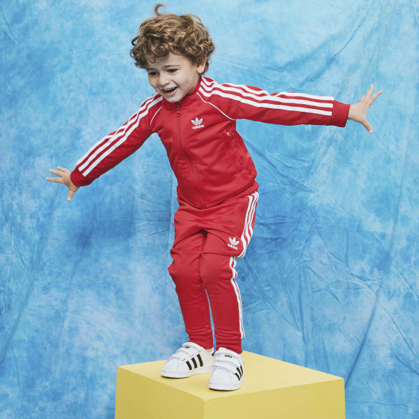 boys red adidas track suit