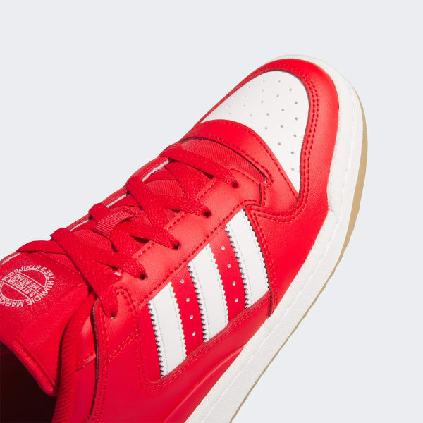 Red member store exclusive adidas sneakers