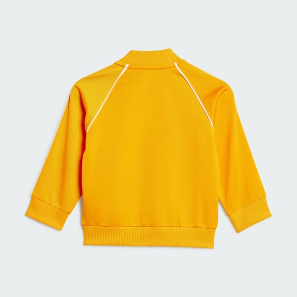 Oranje Adicolor SST Trainingspak Kids