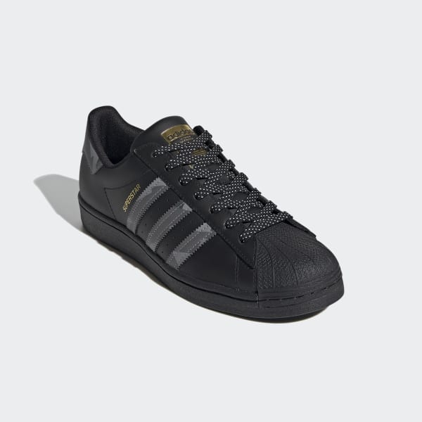 black and gold adidas sneakers