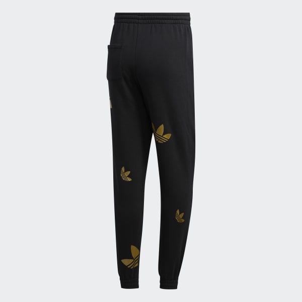black and gold adidas suit