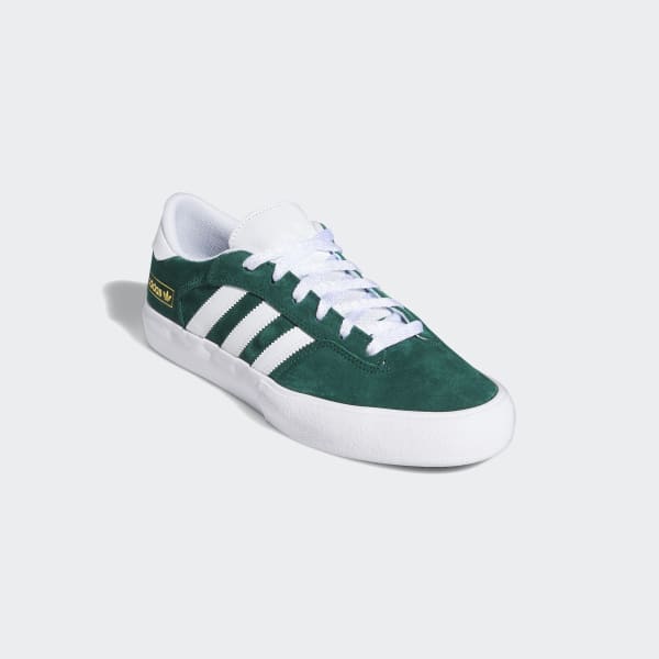 adidas shoes with green stripes