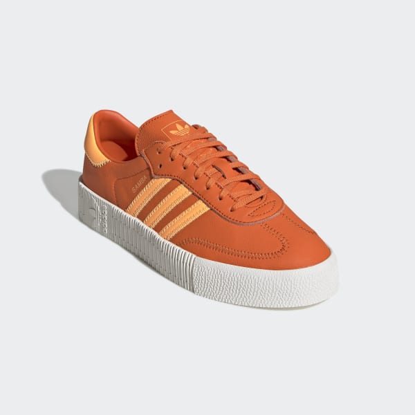 bright orange adidas shoes