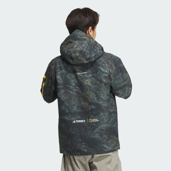 アディダス ナショナル ジオグラフィック 総柄プリント RAIN