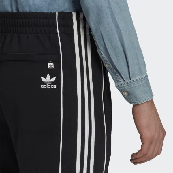 Preto Calças adidas Rekive