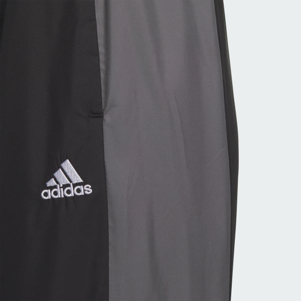 アディダス チーム ルーズフィット ウインドブレーカーパンツ