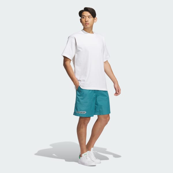 Turquoise Trefoil Logo Play Football Graphic Light Woven Shorts
